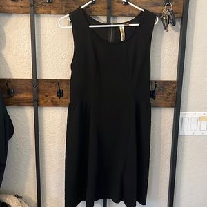 Adorably simple black formal knee-length dress